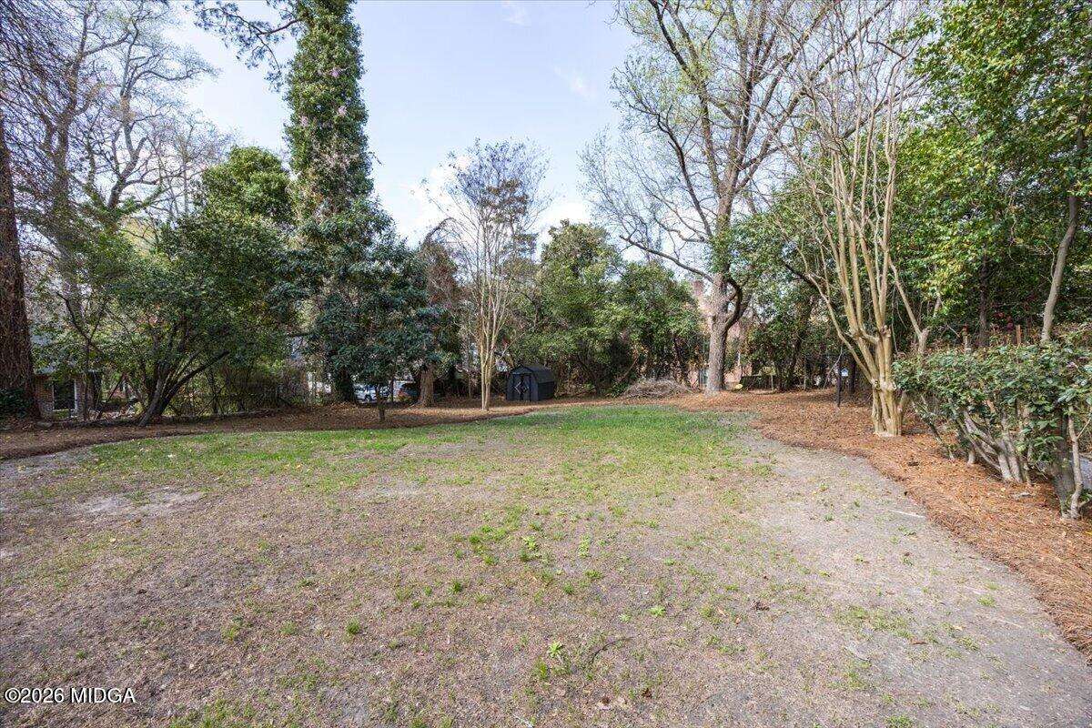 2485 Carlton Way - Joanna "JoJo" Jones Back yard of renovated Midtown Macon home with outdoor deck at 2485 Carlton Way.