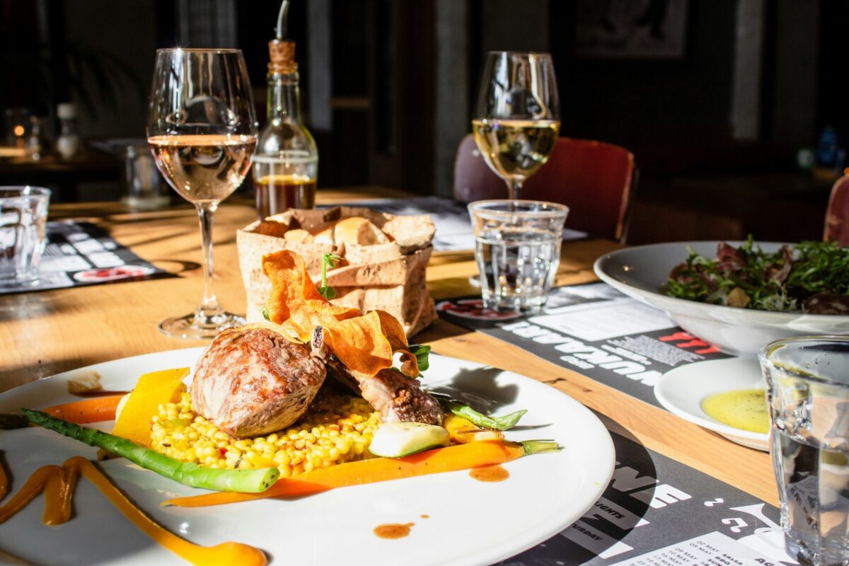 Upscale restaurant dining experience showcasing the type of hospitality and commercial opportunities attracting investors to Downtown Macon, Georgia.