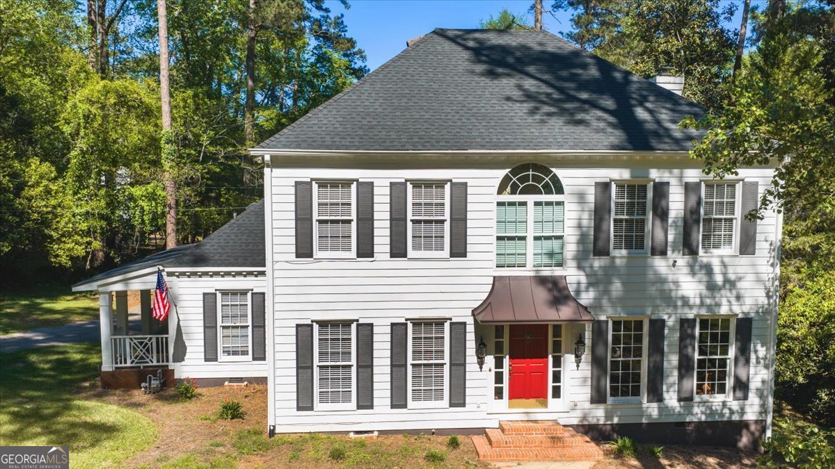 Front view of 3687 Overlook Drive-an extraordinary Midtown retreat where timeless character meets modern luxury.