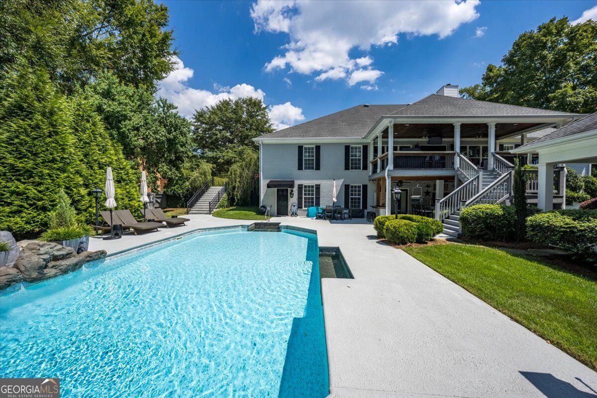 In-ground pool and outdoor entertaining area