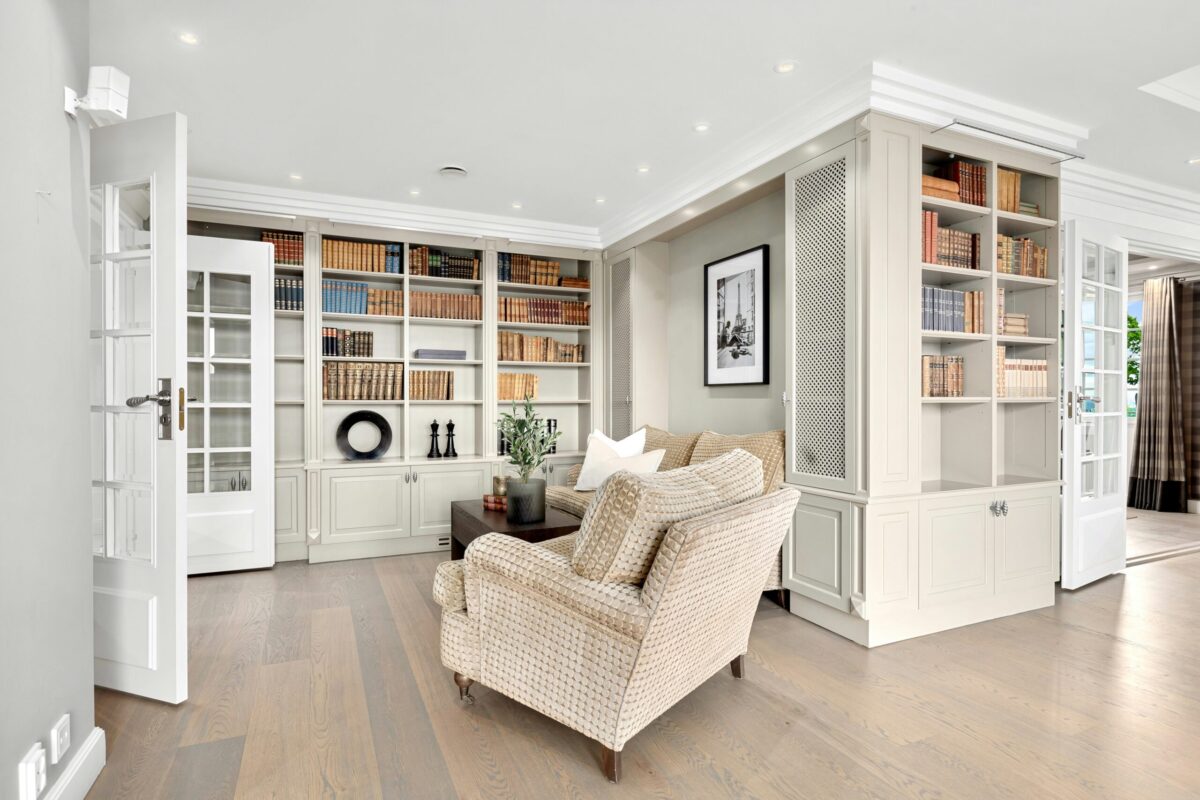 Home Library and Reading Area for Buyers - Joanna "JoJo" Jones - Joanna "JoJo" Jones Elegant home library and reading area with built-in bookshelves and comfortable seating