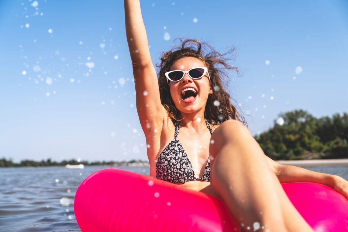 Woman enjoying summer recreation on the water at Lake Tobesofkee in Macon, Georgia